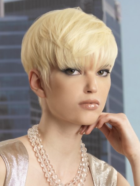 Short blonde haircut with a cropped neck
