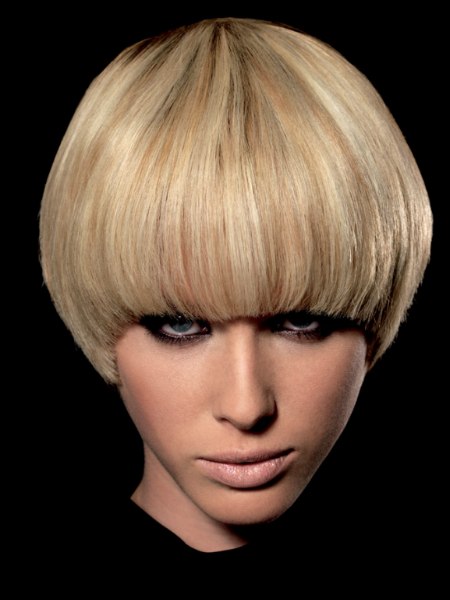 Blonde pudding-bowl haircut