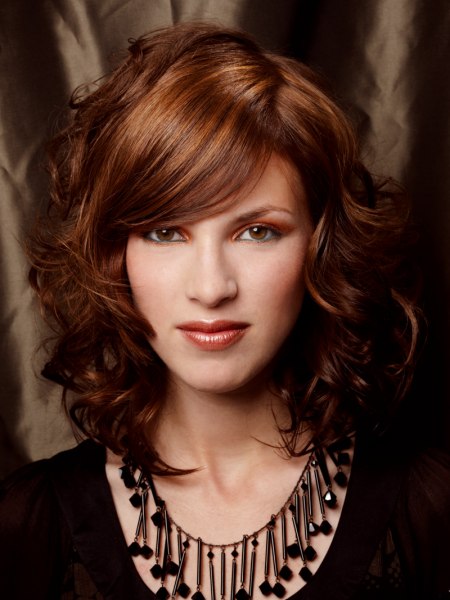Long bob with layers and face-framing curls