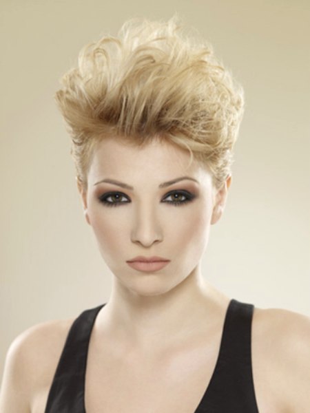 Blonde curled pixie cut