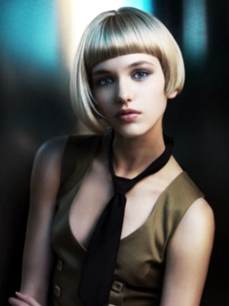 Blonde asymmetric bob with a long and a shorter side