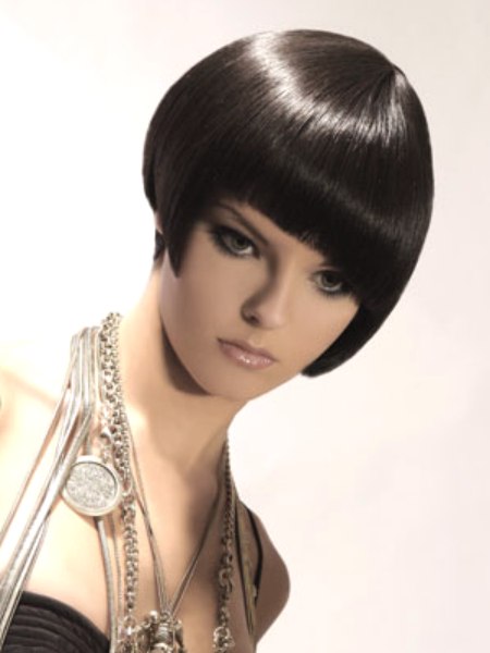 Ink black hair in a bob with a clipped-up nape