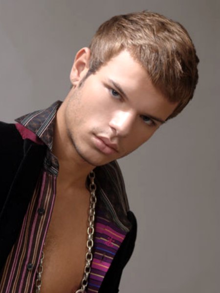 Short men's haircut with forward styling