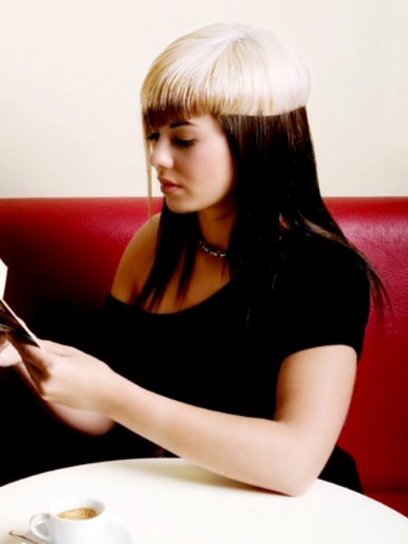 Dual hair coloring with black and platinum blonde
