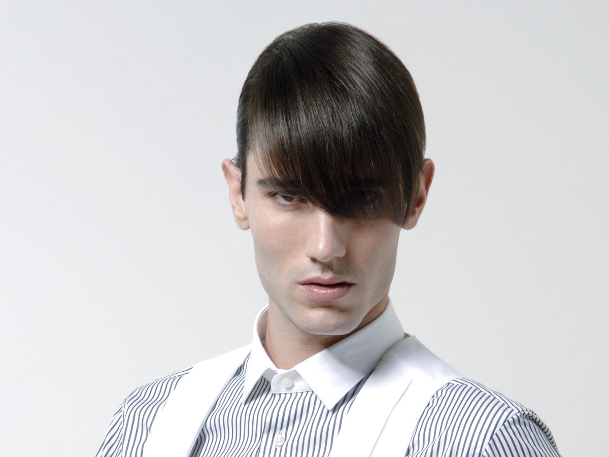 Men's hair cropped super short and styled with pomade Men's hair cropped super short and styled with pomade