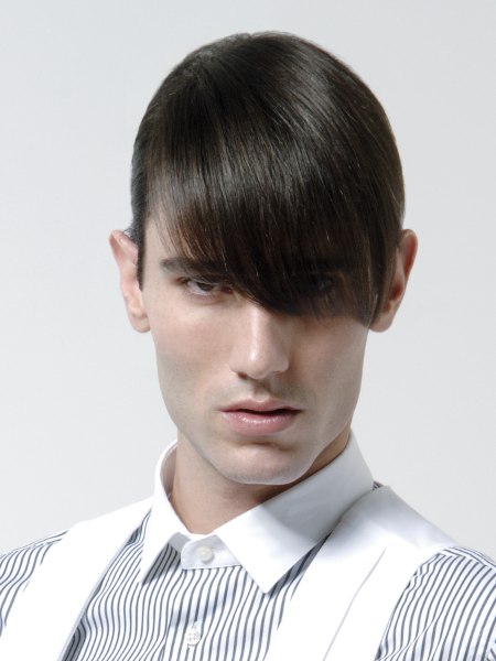 Men's hair with shiny slick wax or pomade styling
