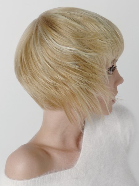 Short blonde haircut with soft layers