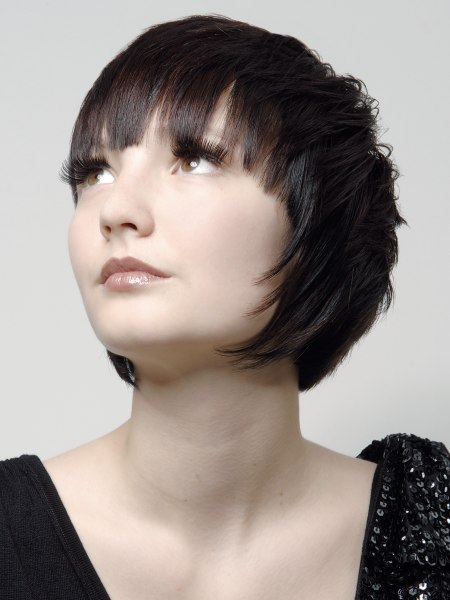 Short hair with face-framing tendrils swept forward