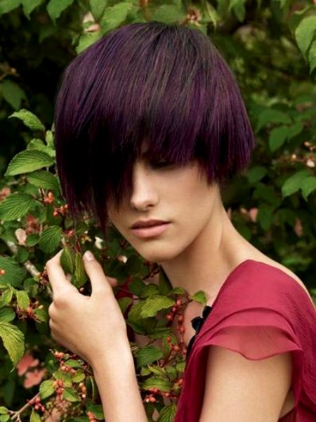 Short dark hair with violet highlights