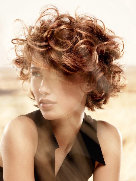Short curly hairstyle with highlights