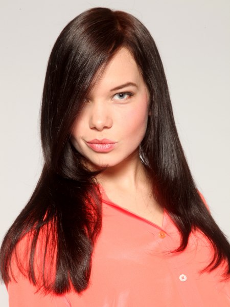 Long hairstyle with natural movement and a chin length fringe