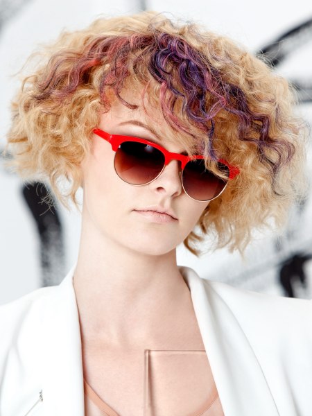 Short blonde hair with purple spiral curls