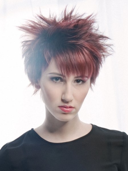 Short red hairstyle with light bangs