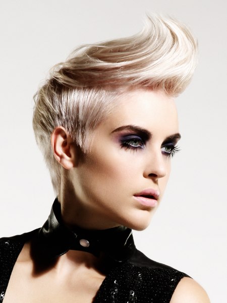 Blonde haircut with very short sides and longer top hair