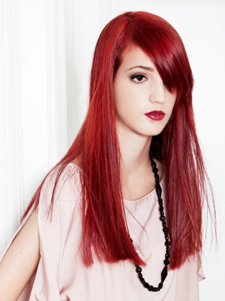 Long red hair with a blunt cutting line
