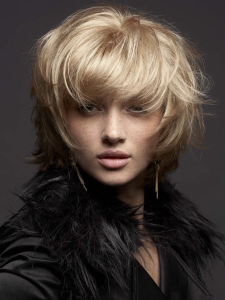 Blonde medium-length hair with ruffled texture
