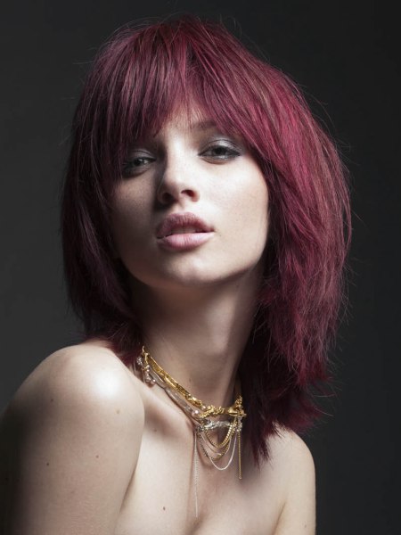 Berry-purple colored shoulder-length hair