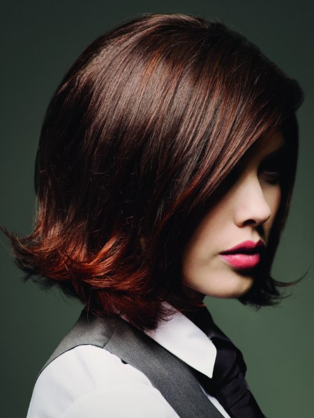 Brown longer than chin length bob with highlights