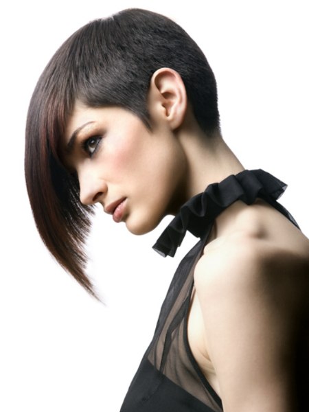 Women's haircut with a buzzed nape
