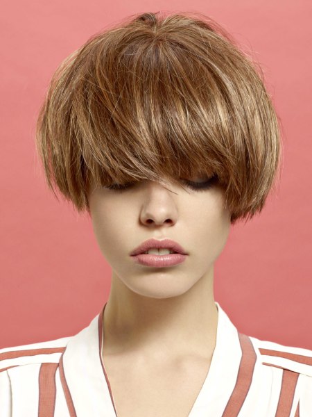 Almost ear-length bob with full bangs