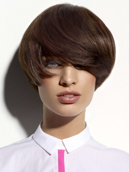 Fashionable short hairstyle with a long fringe