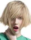 Short bob with hair that flares out to a trapeze shape