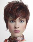 Pixie cut with narrow sides and light top volume