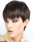 Modern pixie cut with an elongated neckline and bangs