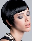 Sleek and slick short black hair with vintage elements