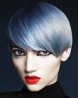 Strict short haircut with side bangs and a blue hair color