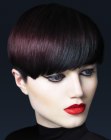Smooth round hairstyle with undercut sides and a shiny surface
