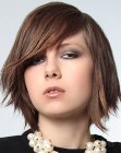 Short hairstyle with jagged edges and deep side bangs