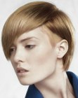 Short hairstyle with curved lines and undershaved hair