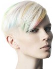 Short platinum blonde hair with pastel accent colors