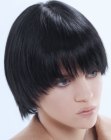 Black bowl cut hair with soft point cut tips