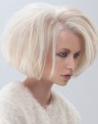 Short blonde bob with simple cutting lines ad volume