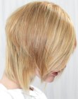 Blonde forward angled hair with a layer that covers the neck