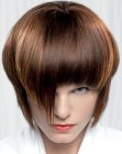Round page boy inspired hairstyle with bangs and irregular tips