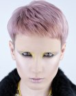 Soft pastel hair cut into a short crop with a shaved nape