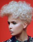 Short white hair with curls and an elongated floating fringe