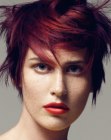 Short red hair with jagged layers and just over the ears sides
