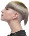 Helmet shape hairstyle with a shaved undercut and elongated sections