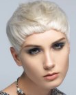 Short platinum blonde hair with neat and textured sections