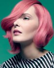 Excentric short hairstyle with sculpted sides for pink hair