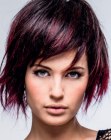 Short razor-cut hair with layers and frazzled edges