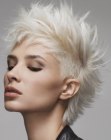 Short platinum blonde hair with a shaved undercut and spikes