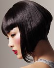 Short plunging A-line bob with a graduated neck for Asian hair