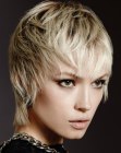 Short pearly blonde hair with texture and wispy tips