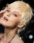 Platinum blonde semi pixie cut with curls