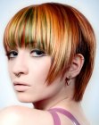 Short hairstyle with streaks of different hair colors